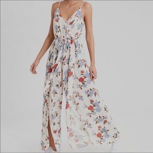 NWT AE Cream Floral Jumpsuit w/ adjustable straps
NWT